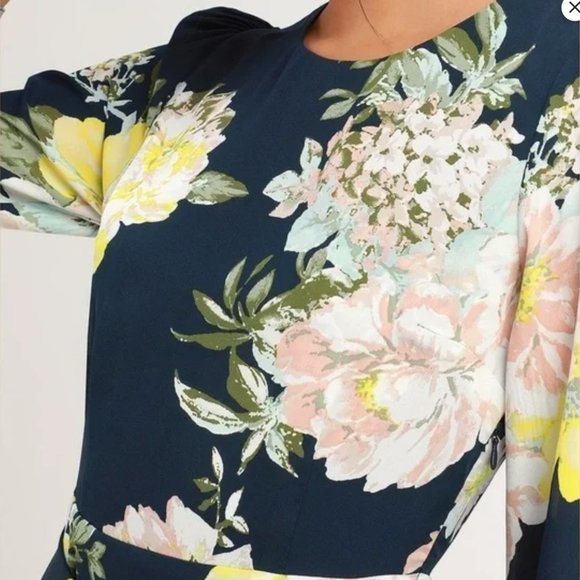 Nante mixed print statement sleeve dress.